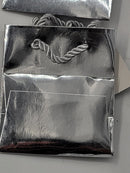 50 Gift Bag 4.5" x 4" x 3” small Glossy Silver Paper Gift Bag- New. Very upscale