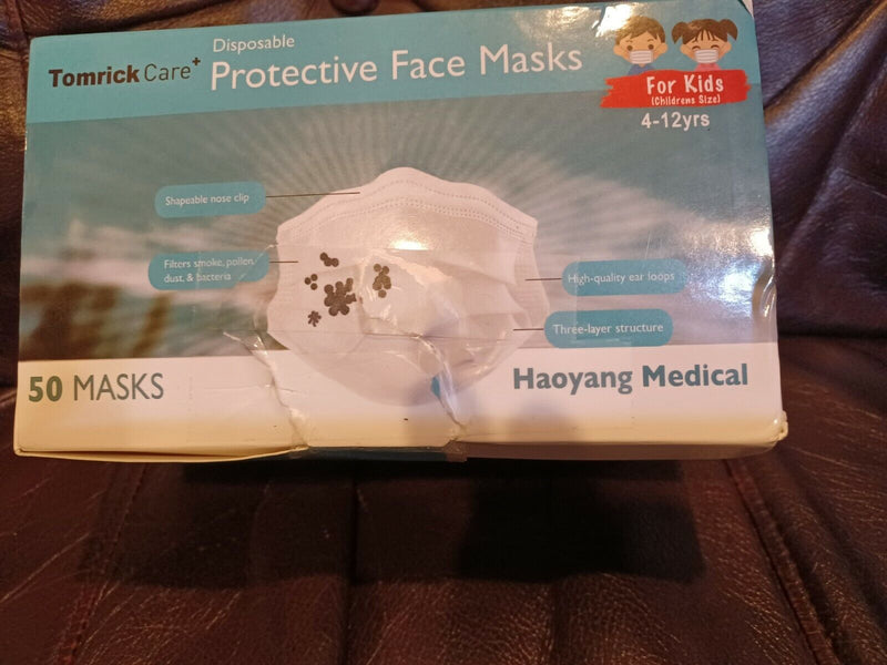 100 Pcs White Protective Face Masks 50 Children plus 50 unopened adult