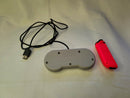 Both Super Nintendo Controller Clv-202 & Orange Joy-Con Right For The Nintendo