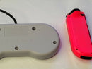 Both Super Nintendo Controller Clv-202 & Orange Joy-Con Right For The Nintendo
